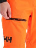 Miniatuur Helly Hansen, Sogn Cargo BB Skibroek Hardshell heren neon Oranje 